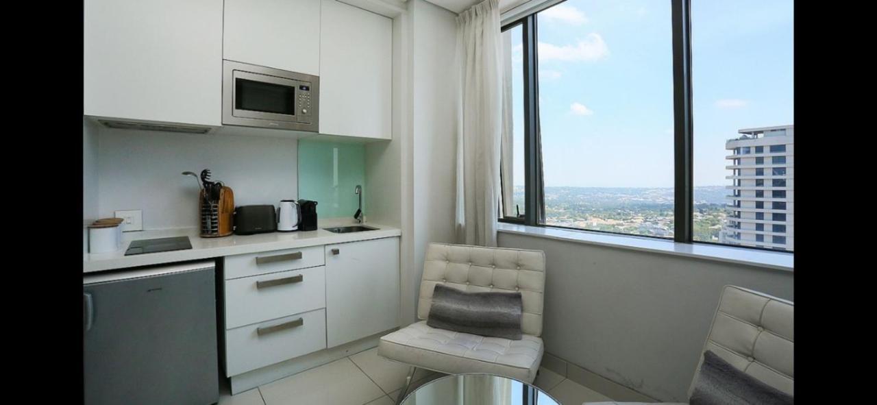 Sandton Skye Suite Johannesburg Bagian luar foto